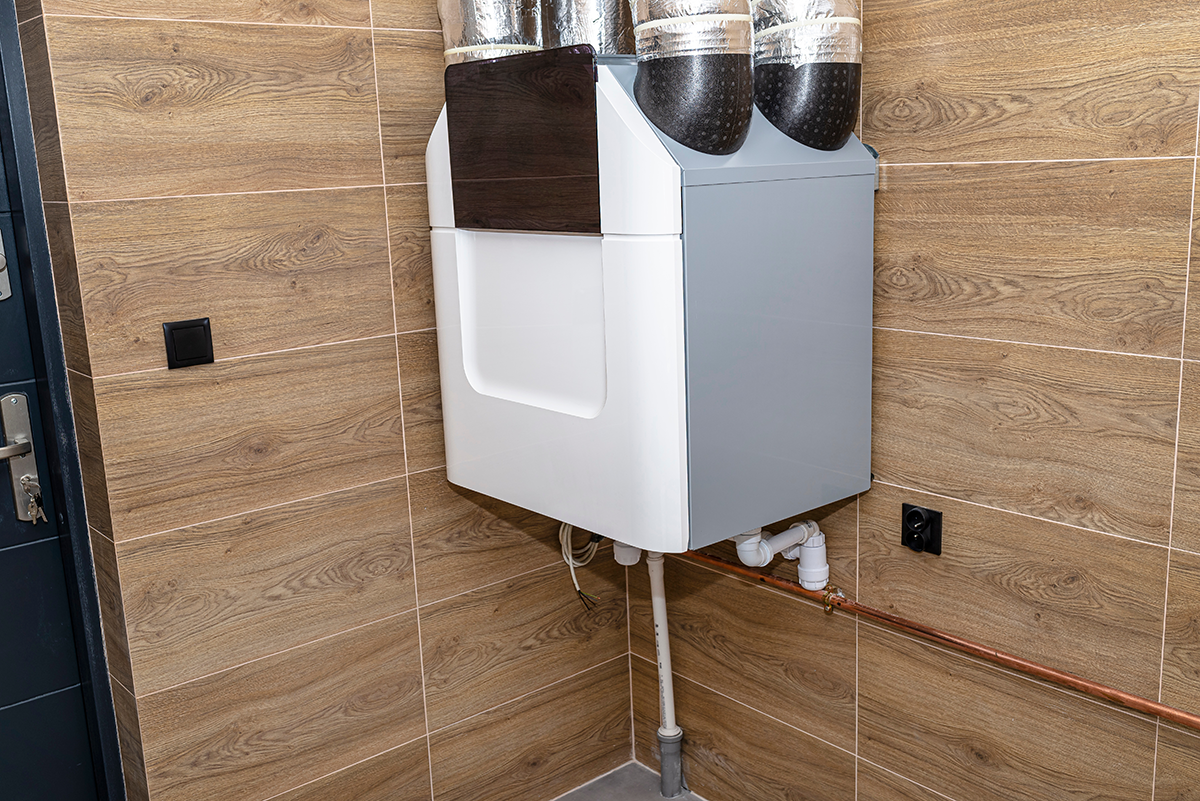 Modern heat recovery ventilator installed in a home HVAC system.