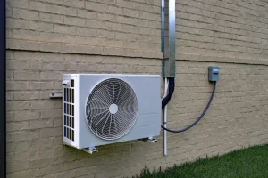 Outdoor condenser that is part of a ductless mini split system requiring regular mini split maintenance