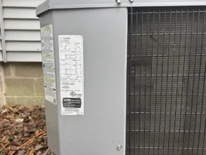 HVAC unit nameplate showing minimum circuit ampacity (MCA) and max breaker (MOCP)